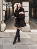 Mink fur opera coat with wide shawl collar and dark brown buttonless front