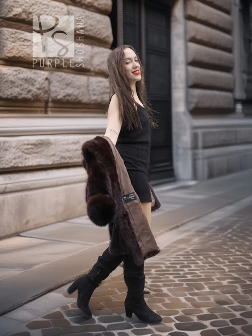 Dark brown mink fur coat with wide collar and small fur pouch detail, side view