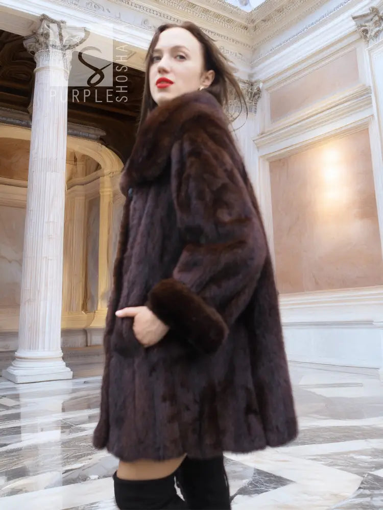 Mink fur opera coat with wide collar and textured panels, dark brown fur