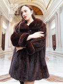 Dark brown mink fur coat with wide collar and layered fur texture, close-up view