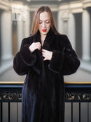 Black mink fur coat with fold-back cuffs, long sleeves and open front
