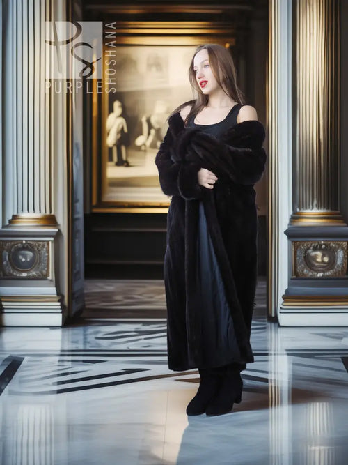 Dark mink fur long coat with fold-back cuffs and off-shoulder neckline detail