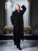 Black mink fur coat with long sleeves and fold-back cuffs