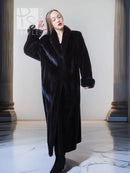 Dark mink fur long coat with fold-back cuffs, full front view and long hem
