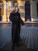 Dark mink fur coat with fold-back cuffs, long hem, button front and collar