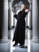 Long dark mink fur coat with fold-back cuffs and wide lapels