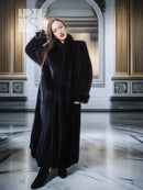 Black mink fur coat with notch collar and fold-back cuffs