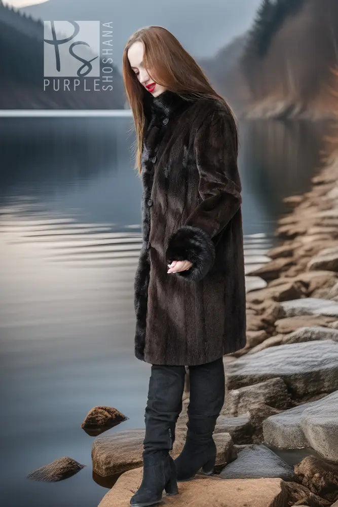Dark fur button-front coat with plush cuffs, knee-length, side view