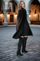 Dark mink coat with plush stand collar and full-length button front