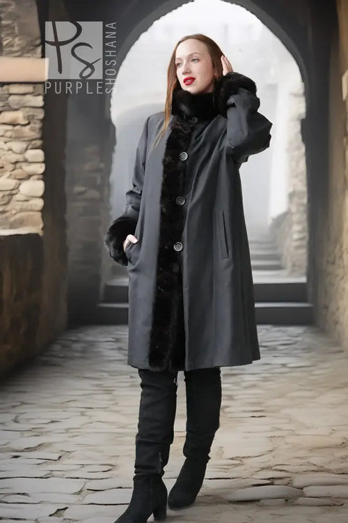 Dark shearling-style mink coat with button placket and large collar