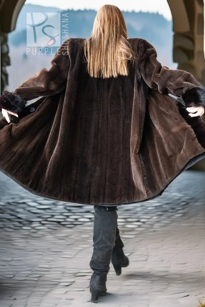 Mink coat back view with button closure and voluminous sleeves