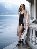 Cream beaver fur coat with open front and deep collar; mid-calf side view.