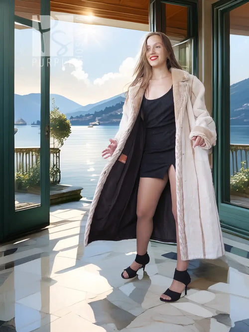 Cream beaver fur coat, long open front with textured fur.