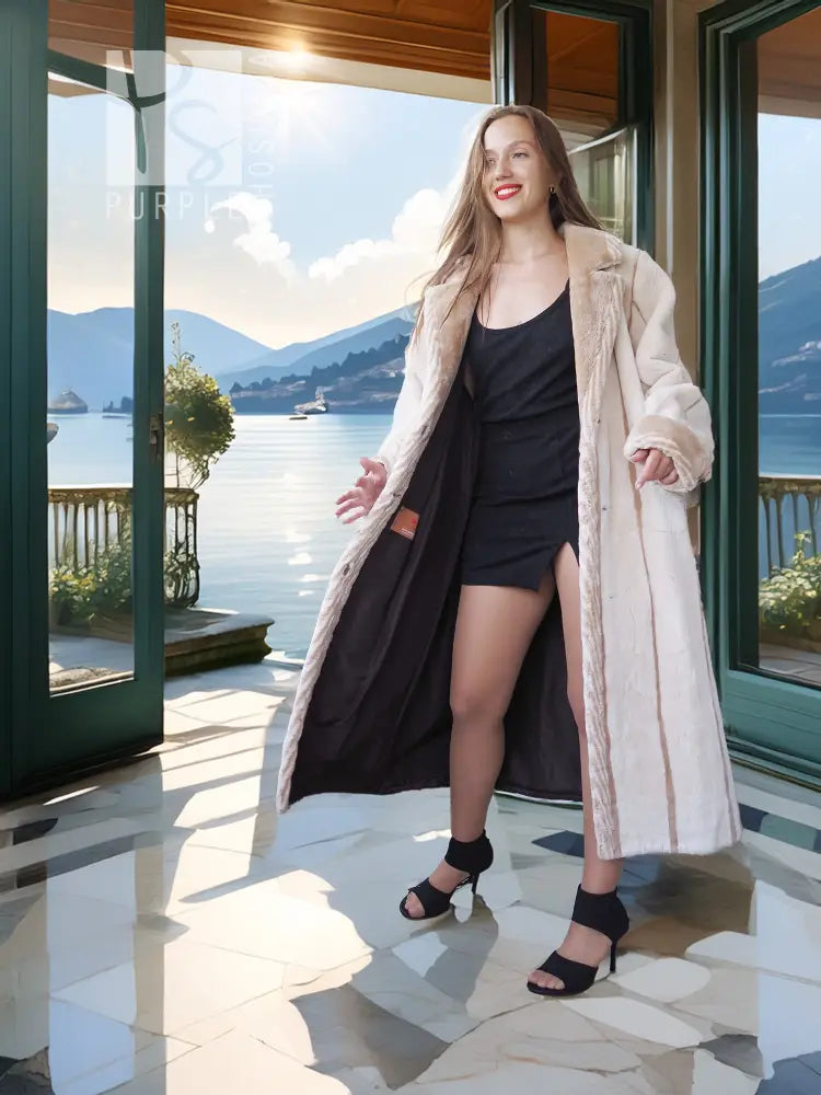 Cream beaver fur coat, long open front with textured fur.