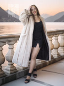 Cream beaver fur coat, long open front with vertical shear texture.