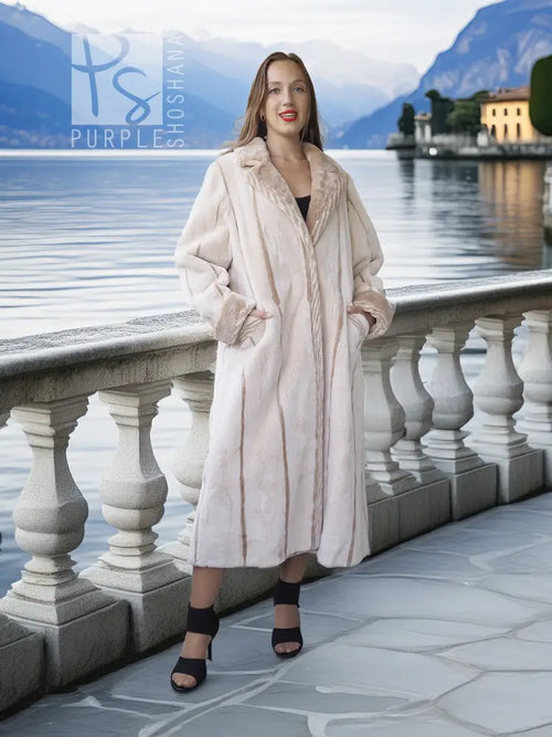Cream sheared beaver fur coat in full length with open front and long sleeves