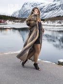 Vintage fox fur coat with hooded collar, long gray and tan striped texture.