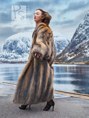 Gray and amber fox fur coat in profile, long length with buttonless front and drape.