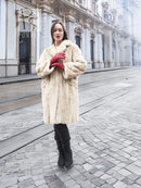 Beige mink fur coat with straight front and long sleeves