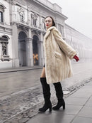 Vintage beige mink fur coat with swingy hem, wide collar and long sleeves