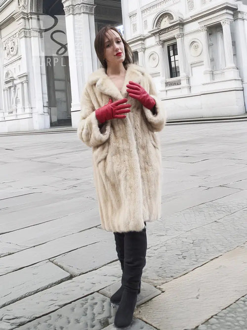 Vintage beige mink fur coat centered front, wide collar and longline fur texture