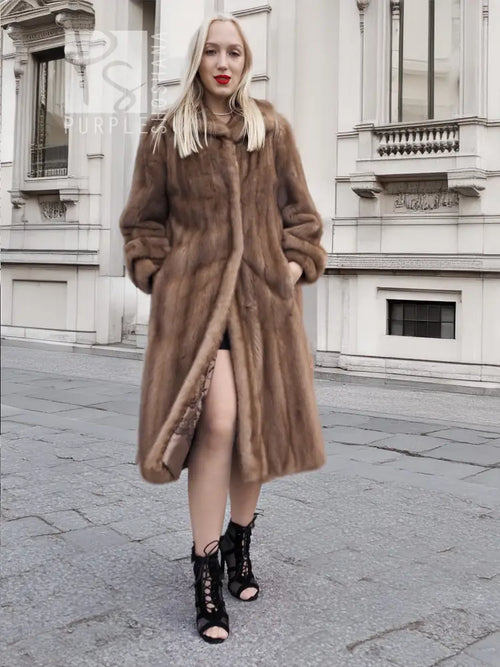 Brown mink fur coat with open front slit, long sleeves, and plush fur collar