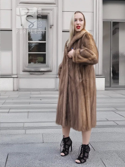 Brown mink fur coat with hood, front view, long sleeves, midi length.
