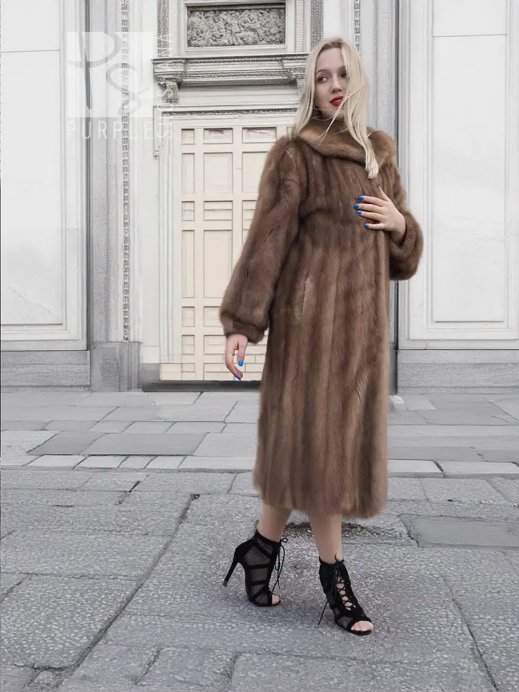Brown mink fur coat with hood, front view, long sleeves, midi length, side pose.