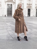 Brown mink fur coat with high collar, long sleeves, front open design.