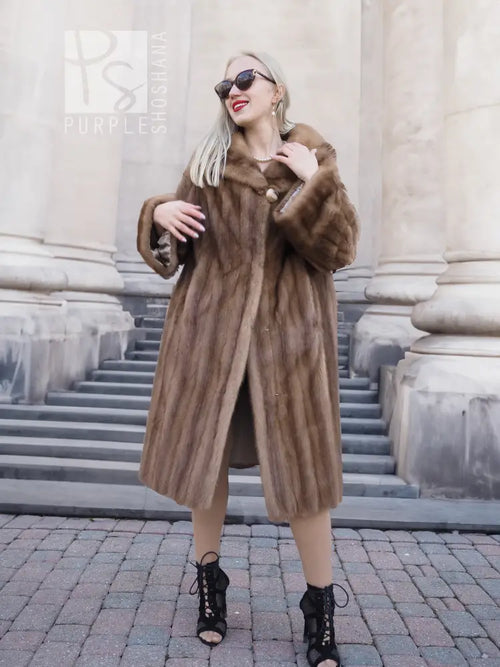 Brown mink fur coat with hood, long sleeves, straight mid-calf shape, front button closure