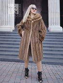 Brown mink fur coat with hood, mid-calf length, long sleeves, side view