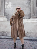 Brown mink fur coat with hood and wide collar, long sleeves, front button closure