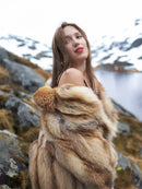 Hooded fur coat collar detail with tan-and-brown striped texture, front open.