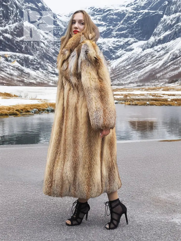 Long tan fur coat, open front; full-length view showing straight hem and sleeves.