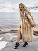 Long tan fur coat with open front; model angled side view, hands by sides.