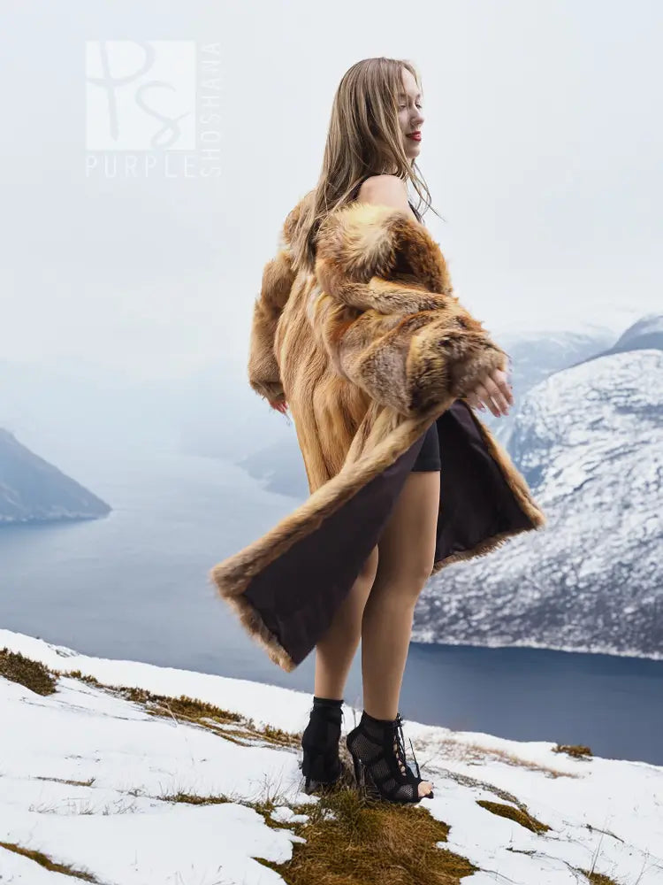 Fox fur coat side view with long slit and dark inner panel