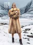 Tan fur coat with thick collar and full-length silhouette, front view.