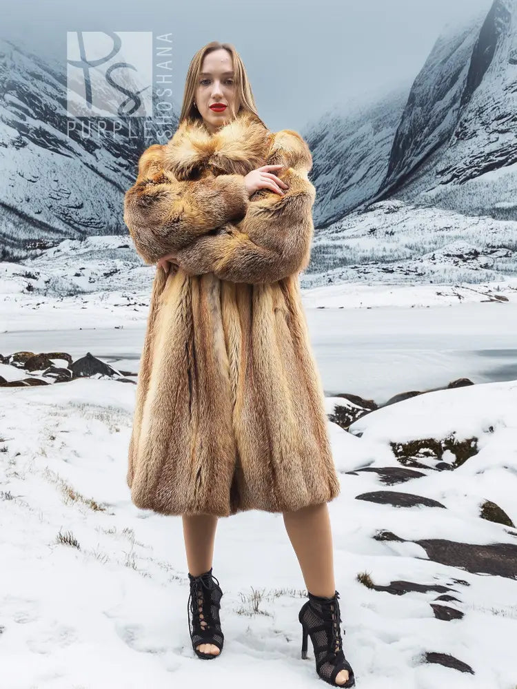 Tan fur coat with thick collar and full-length silhouette, front view.
