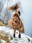 Hooded fur coat with oversized collar, tan and brown striped panels