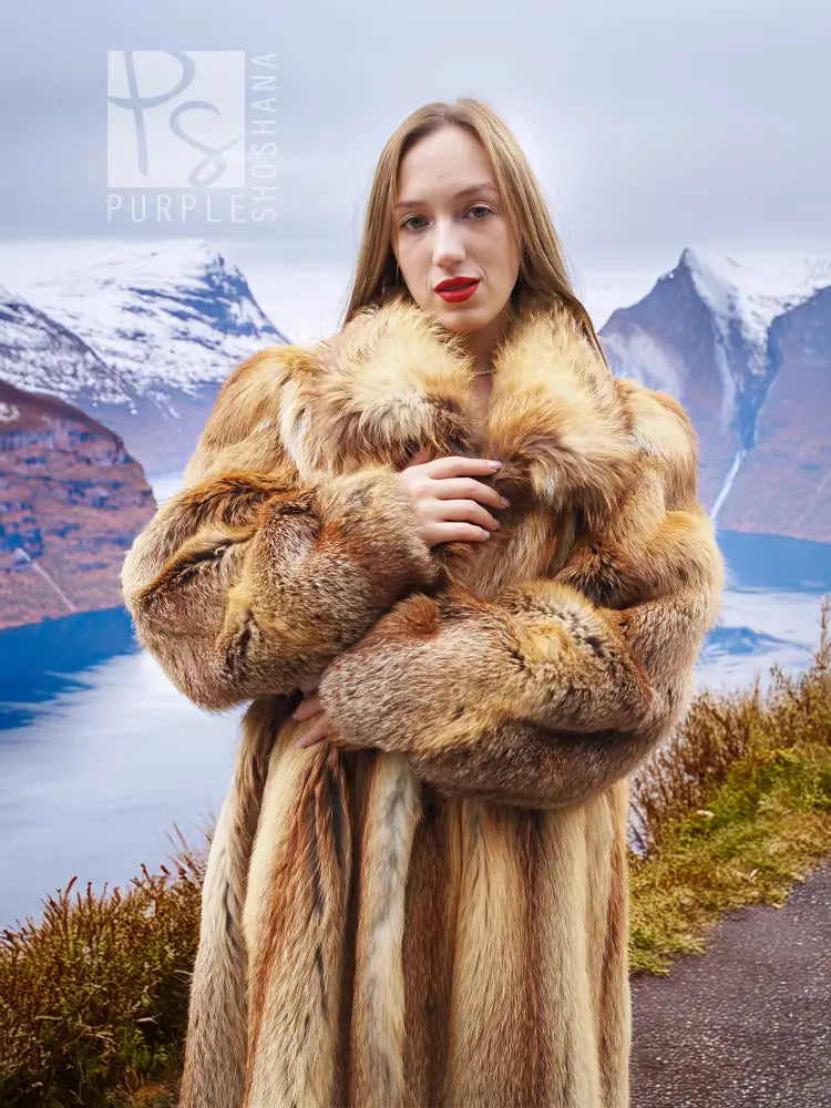 Fox fur coat with thick fur collar and long buttonless front; golden-brown tone