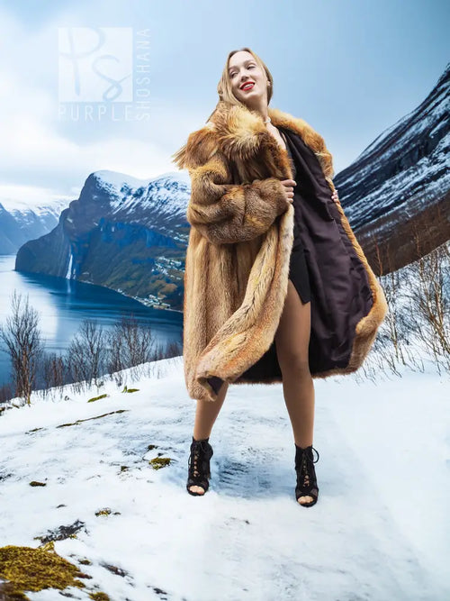 Fox fur coat with open front and draped sleeves; black dress lining
