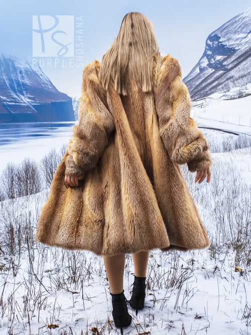 Fox fur coat from back, flared hem and long sleeves; golden-brown
