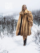 Fox fur coat front view with full skirt and textured fur; golden-brown