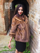 Beige mink fur opera jacket, flared short hem with soft shawl collar.