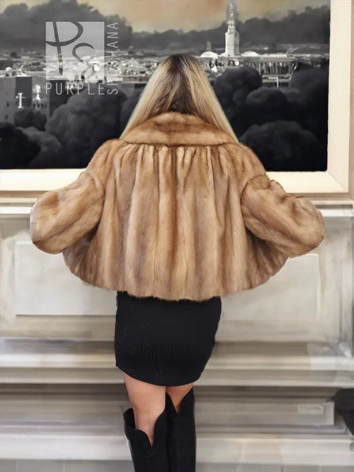 Pastel beige mink fur opera jacket, back view with gathered yoke and short hem