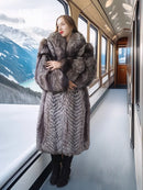 Silver-gray faux fur long coat with wide collar and chunky textured sleeves
