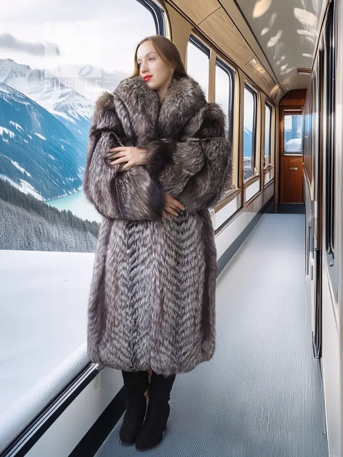 Silver-gray faux fur long coat with wide collar and chunky textured sleeves