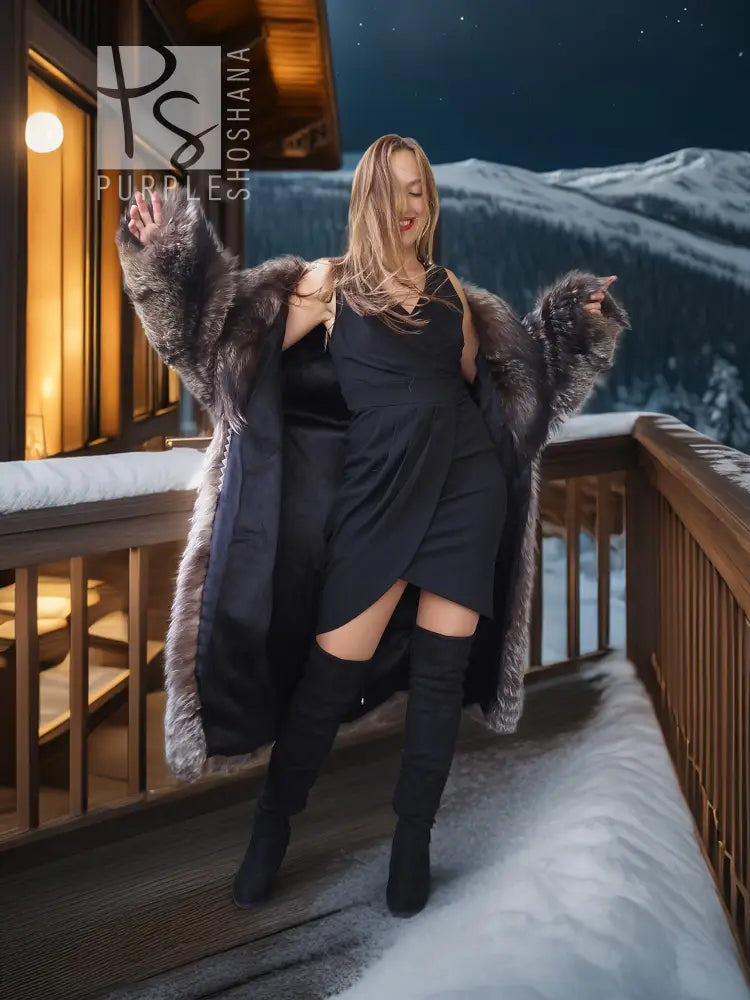 Silver-gray faux fur coat with plush shoulder volume over black sleeveless dress