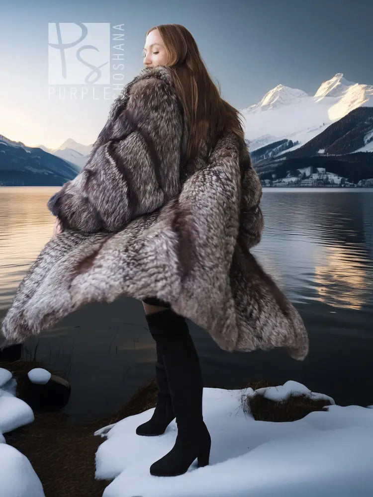 Long gray fox-fantasy fur coat with wide collar, worn over black dress