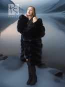 Black fox fur coat with shawl collar, arms near neckline, full-length view